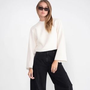 Tibi white flared long sleeve top